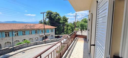 a balcony with a view of a building at levanta in Konitsa