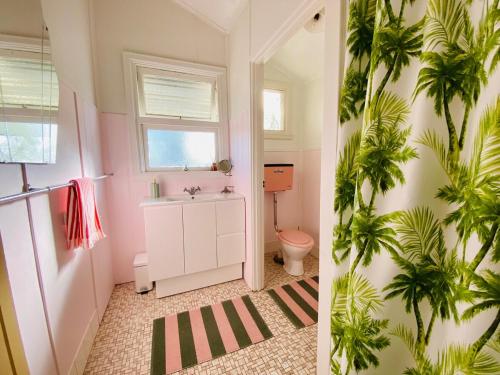 a bathroom with a sink and a toilet at Betty's Shack in Walpole