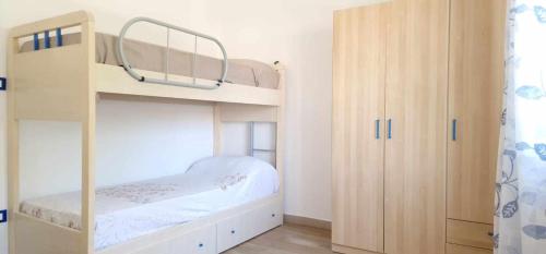 Postel nebo postele na pokoji v ubytování Lungomare - Casa Vacanze