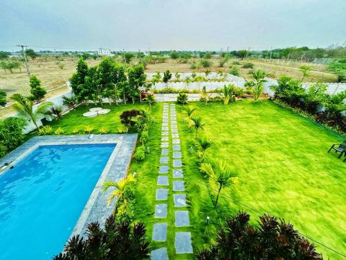 Fotografie z fotogalerie ubytování Blissful Retreat Farm Stay v destinaci Venkatāpur