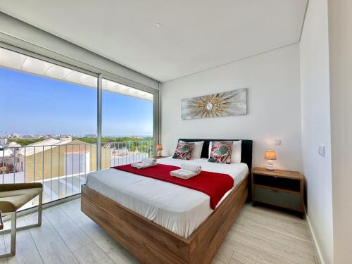 Voodi või voodid majutusasutuse Vilamoura Panoramic 2 With Pool by Homing toas