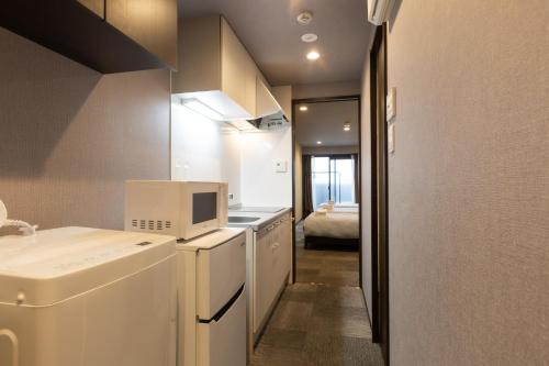 Kuchyň nebo kuchyňský kout v ubytování Miro Hotel Imadegawa