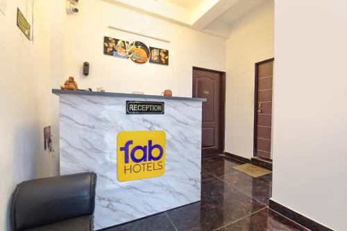 Un certificado, premio, letrero u otro documento en FabHotel Avondale - Sitapura