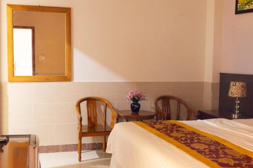 Cama o camas de una habitación en Hoang Anh Star Boutique Hotel