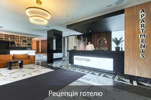 a lobby of a hotel with a reception desk at Fomich Residence in Bukovel