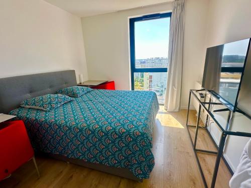 Posteľ alebo postele v izbe v ubytovaní Appartement standing Vue panoramique sur Nantes