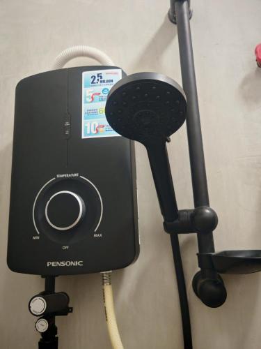 a speaker hooked up to a wall at Defaso Homestay Kota Marudu in Kampong Karungkon
