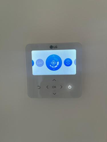 an ipod with the ok button on it at Le Casette CINQUE in Pacengo di Lazise