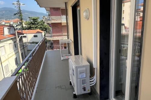 a heater on a balcony of a building at Apollo in Arma di Taggia