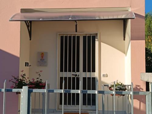 a front door of a house with an awning at B&b DI CICCONE MARIATERESA in Conza di Campania