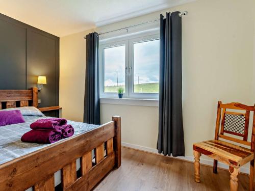 Ένα ή περισσότερα κρεβάτια σε δωμάτιο στο 2 Bed in New Lanark 95359