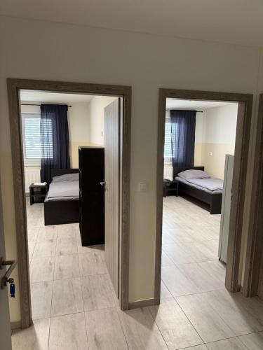Postel nebo postele na pokoji v ubytování Work Home