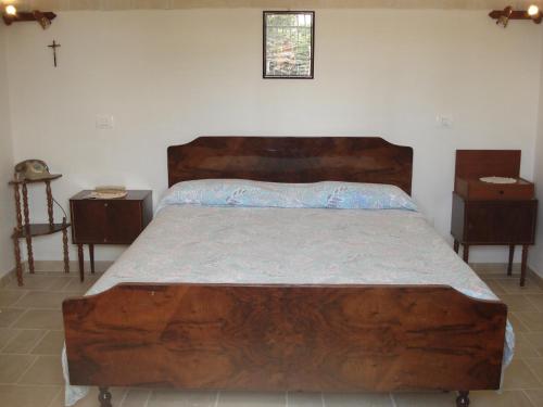 A bed or beds in a room at Trullo Salamina