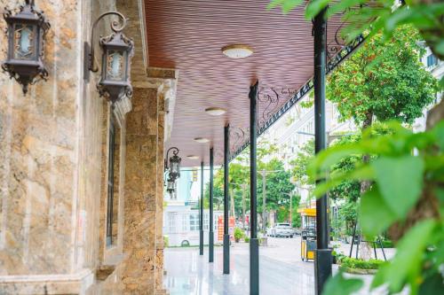 a row of street lights on the side of a building at Crystal Holiday Ha Long Hotel in Ha Long