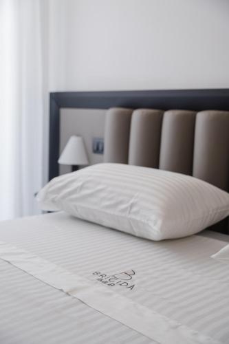 Postel nebo postele na pokoji v ubytování Brigida B&B