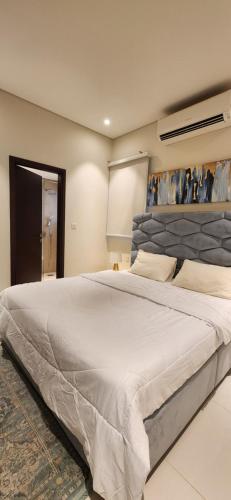 Un pat sau paturi într-o cameră la Hawana Resort Salalah