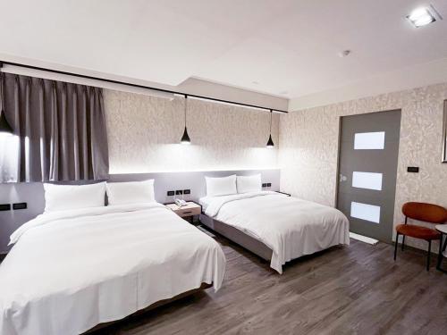 Postel nebo postele na pokoji v ubytování Dolamanco Hotel