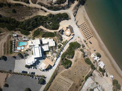 an aerial view of a house next to a beach at Golden Milos Beach Ηouse by Domotel in Provatas