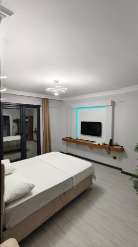 Letto o letti in una camera di KILIÇ MOTEL