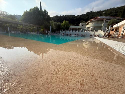 a large pool of water with reflections in the water at B&B Pacilita in Pianopoli