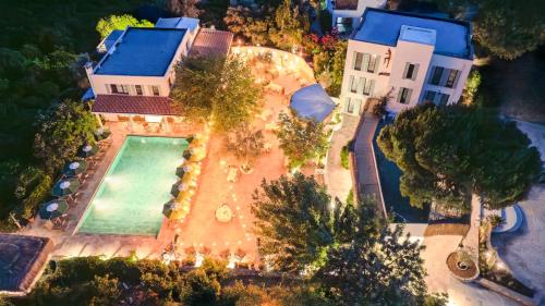 an overhead view of a house with a swimming pool at InOne Bitez Hotel in Bodrum City