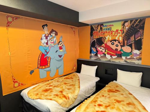Postel nebo postele na pokoji v ubytování Henn na Hotel Tokyo Asakusabashi