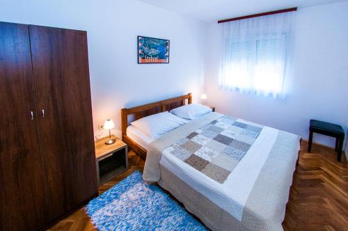 Una cama o camas en una habitación de Rooms Rajič