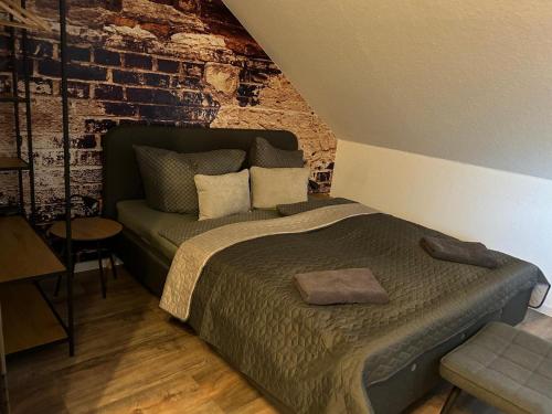 Postel nebo postele na pokoji v ubytování Ferienwohnung Zeitz - Weiße Elster Apartment