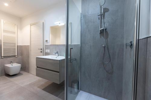 a bathroom with a shower and a sink at Casa di Gio in Cavalese