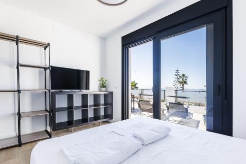 Ένα ή περισσότερα κρεβάτια σε δωμάτιο στο A&N Terraza al Mar
