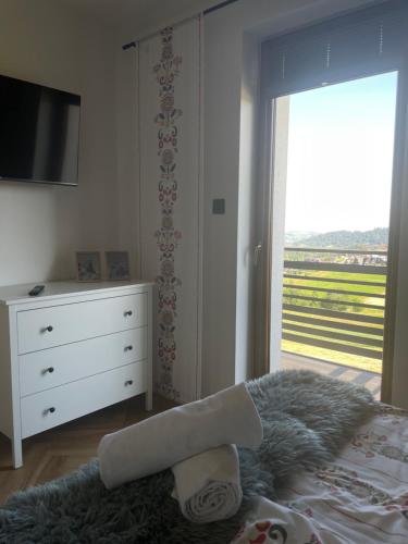 Apartament u Jagi Sądelska 119fにあるベッド