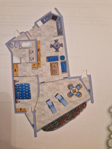 a drawing of a floor plan on a wall at Anfi Beach in Mogán