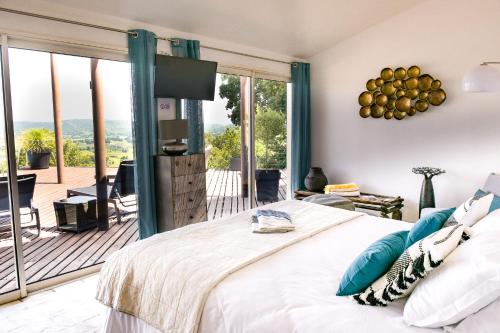 En eller flere senge i et værelse på Les Hauts d'Avignon