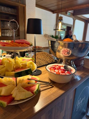a buffet with several plates of food on a table at Boga's im Schützenhof Hüttenbusch in Worpswede