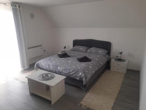 Una cama o camas en una habitación de Miličin konak