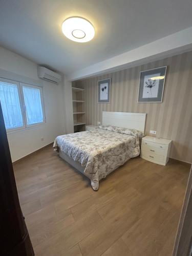 a bedroom with a bed in a room at El Coso in Santa Cruz de la Zarza