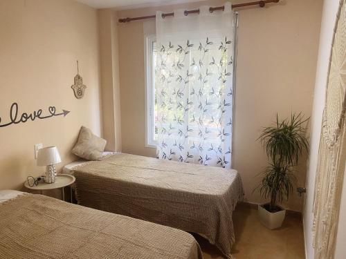 Postel nebo postele na pokoji v ubytování Appartment Maximar