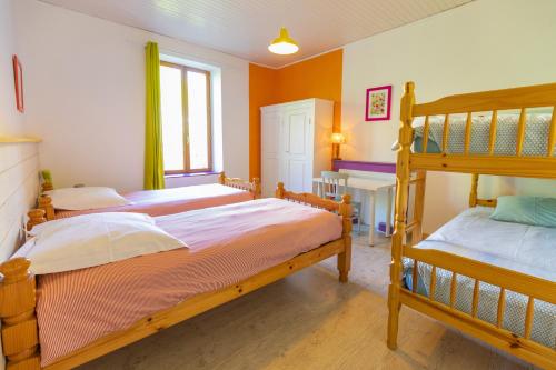 Postel nebo postele na pokoji v ubytování Gîte Kalinka