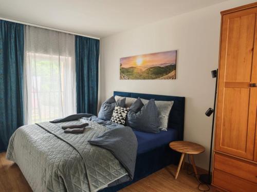 Una cama o camas en una habitación de Apartmán 4, Pstruží, Krušné hory