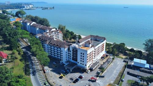 an aerial view of a resort next to the ocean at 13pax BAYU EXECUTIVE SUITE 3R2B, SEASIDE, ROOFTOP BBQ, WATERSPORT, Pool, Wifi, 50"TV in Port Dickson