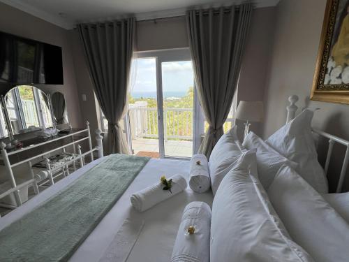 Postel nebo postele na pokoji v ubytování Seaview Manor Exquisite Bed & Breakfast