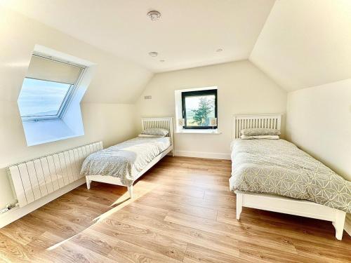 Ένα ή περισσότερα κρεβάτια σε δωμάτιο στο The Summit - Skellig Coast