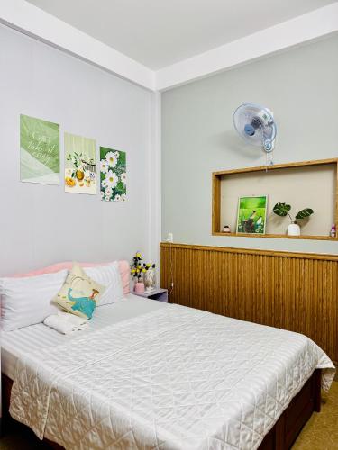 Postel nebo postele na pokoji v ubytování T&T Homestay Hue