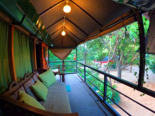 Postel nebo postele na pokoji v ubytování Jungle Cabin - Bundala