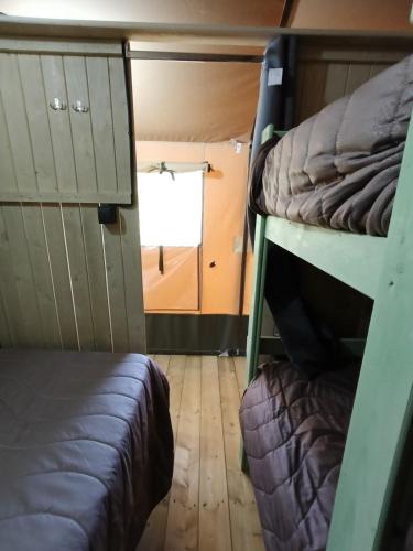 Postel nebo postele na pokoji v ubytování CS Glamping - Tende