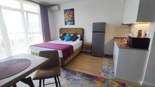 Η κουζίνα ή μικρή κουζίνα στο Top Beachfront Apartment