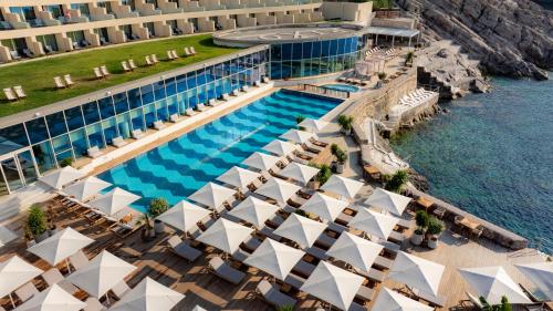 an aerial view of a resort with a swimming pool at Rixos Premium Dubrovnik in Dubrovnik