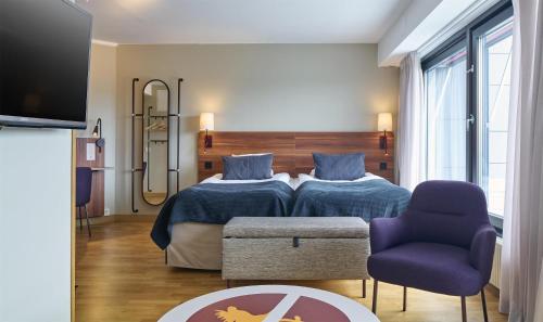 Una cama o camas en una habitación de Scandic Backadal