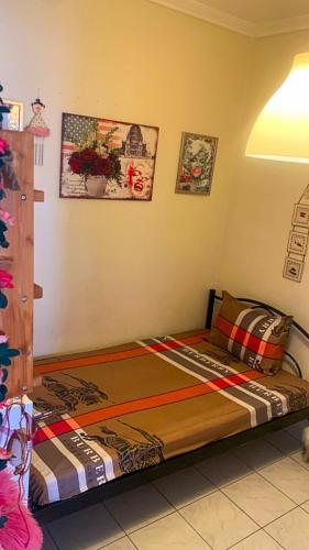 a bedroom with a bed in a room at Queen Suites Family Friendly 60m2 in Thessaloniki