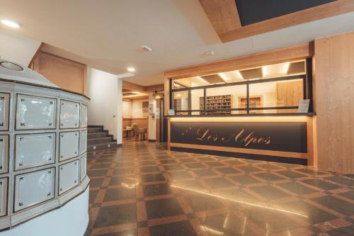 a room with a store with a sign that says new wines at Residence Des Alpes in Cavalese